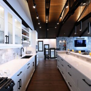 High-end kitchen design build in ski chalet created by Kelowna & Big White Custom home builder designer