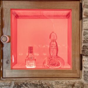 Custom display cabinet in wine room built by Big White custom chalet builder & Kelowna home builder & Kelowna Contractor