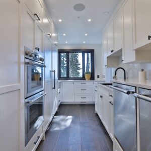 Custom prep kitchen in ski chalet designed by Kelowna home builder & Big White custom home builder designer