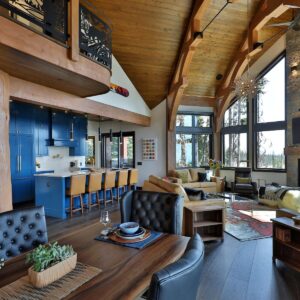 Custom ski chalet with arched timber rafters designed by Kelowna home builder & Big White custom home builder designer