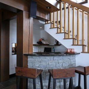 Compact bar to utilize space in Feathertop ski chalet created by Big White chalet design builder designer