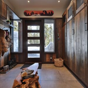 Wood paneling for ski chalet bootroom built by Kelowna & Big White Custom home design builder