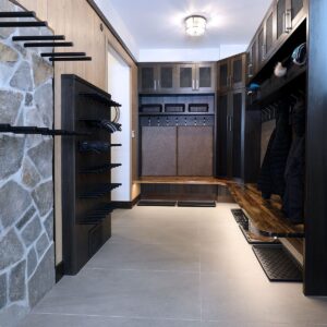 Custom designer & Big White luxury home builder created a rustic boot room in ski chalet