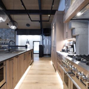 Breakfast bar & kitchen island designed by Big White chalet builder & Kelowna custom home builder designer
