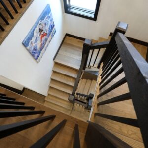 Wood railings on staircase built by Big White, BC custom home builder & Kelowna contractor