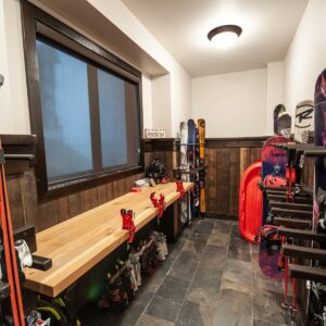 Custom tuning workstation for skis snowboards in ski chalet boot room created by Kelowna & Big White Custom home design builder