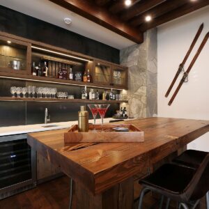 Wood bar top table design at Big White Ski Resort built by Big White custom chalet builder & Kelowna residential home builder & home designer