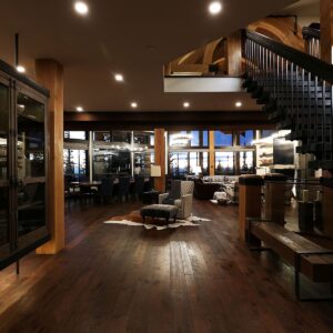 Open concept design in custom home designed by Big White chalet builder & Kelowna construction company & home designer