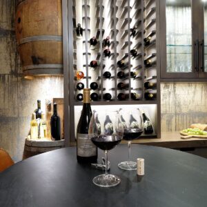 Custom wine room design in ski chalet built by Big White custom chalet builder & Kelowna custom home builder & home designer