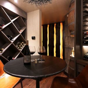 Private wine cellar designed by Big White custom chalet builder & Kelowna custom home builder & home designer