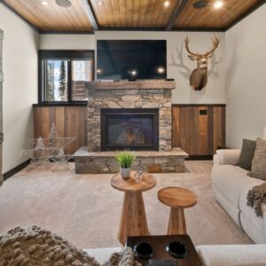 Barn door in den built by Big White, BC custom home builder & Kelowna custom home builder designer