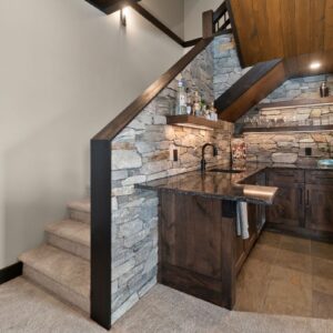 Granite countertop bar designed by Big White, BC custom home builder & Kelowna custom home builder designer