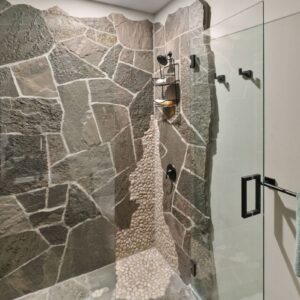 Flagstone shower designed by Big White, BC custom home builder & Kelowna custom home builder designer