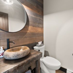 Rustic bathroom designed by Big White, BC custom home builder & Kelowna custom home builder designer
