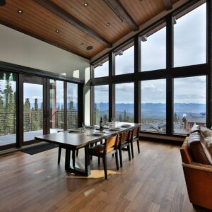 Wood flooring & custom wood table designed by Big White construction company & Kelowna construction company