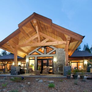 Custom design build featuring timber rafters & wood soffits in timber frame home in Kelowna, BC built by Kelowna custom home builder