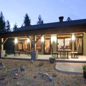 Outdoor patio design at Timber frame home built by Kelowna custom home builder designer