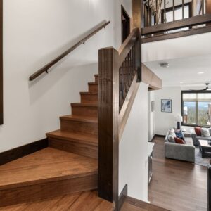 Wood timber staircase designed by Big White custom home builder & Kelowna custom home builder designer