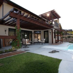 Timber wood pergola in private back yard built by Kelowna luxury home builder & custom home designer